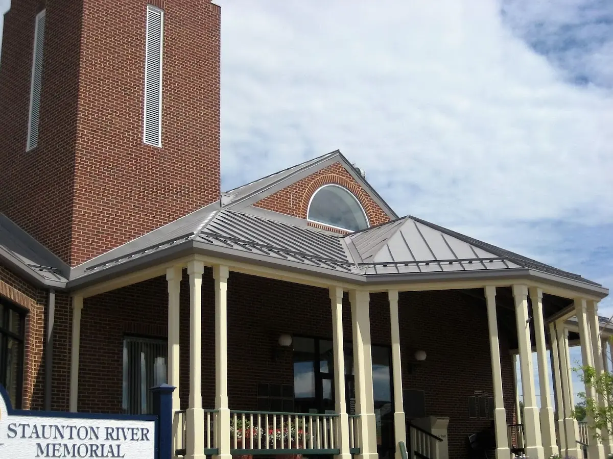 Skilled roofing craftsmen working on a residential roof in Wrightville